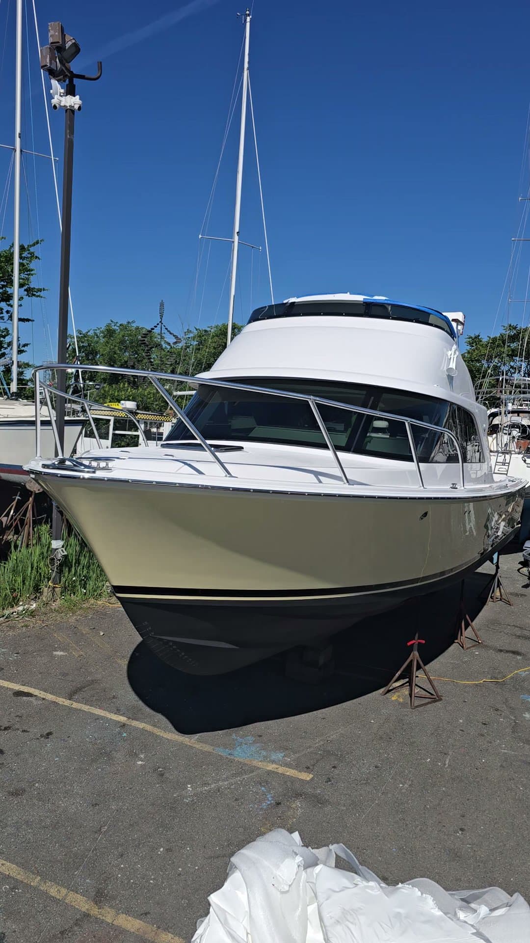A 2026 Bertram 35 on the hard, being commissioned after her road delivery from the factory